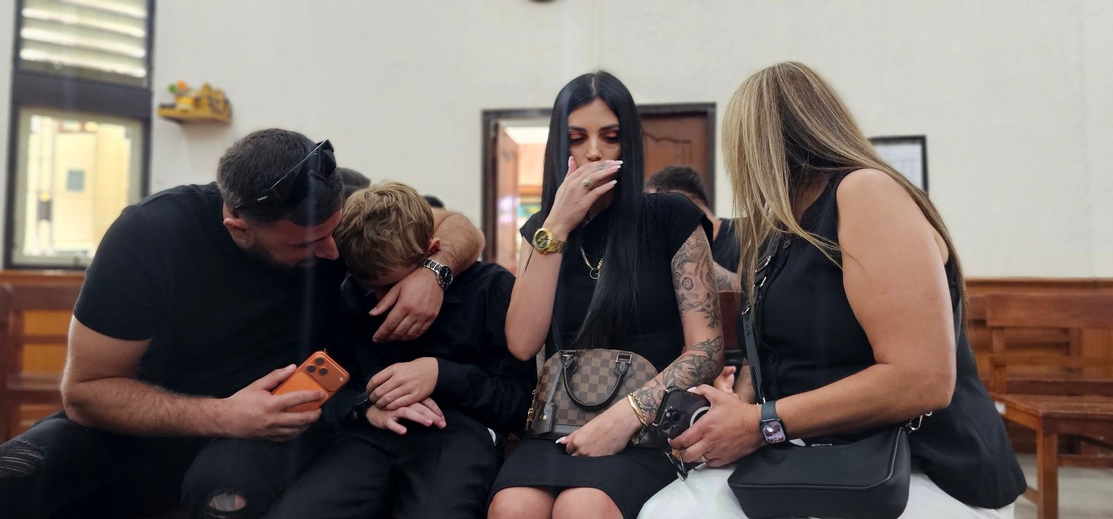 Jazmyn Goudes widow of Zivan R with son and family watch inside court hearing today