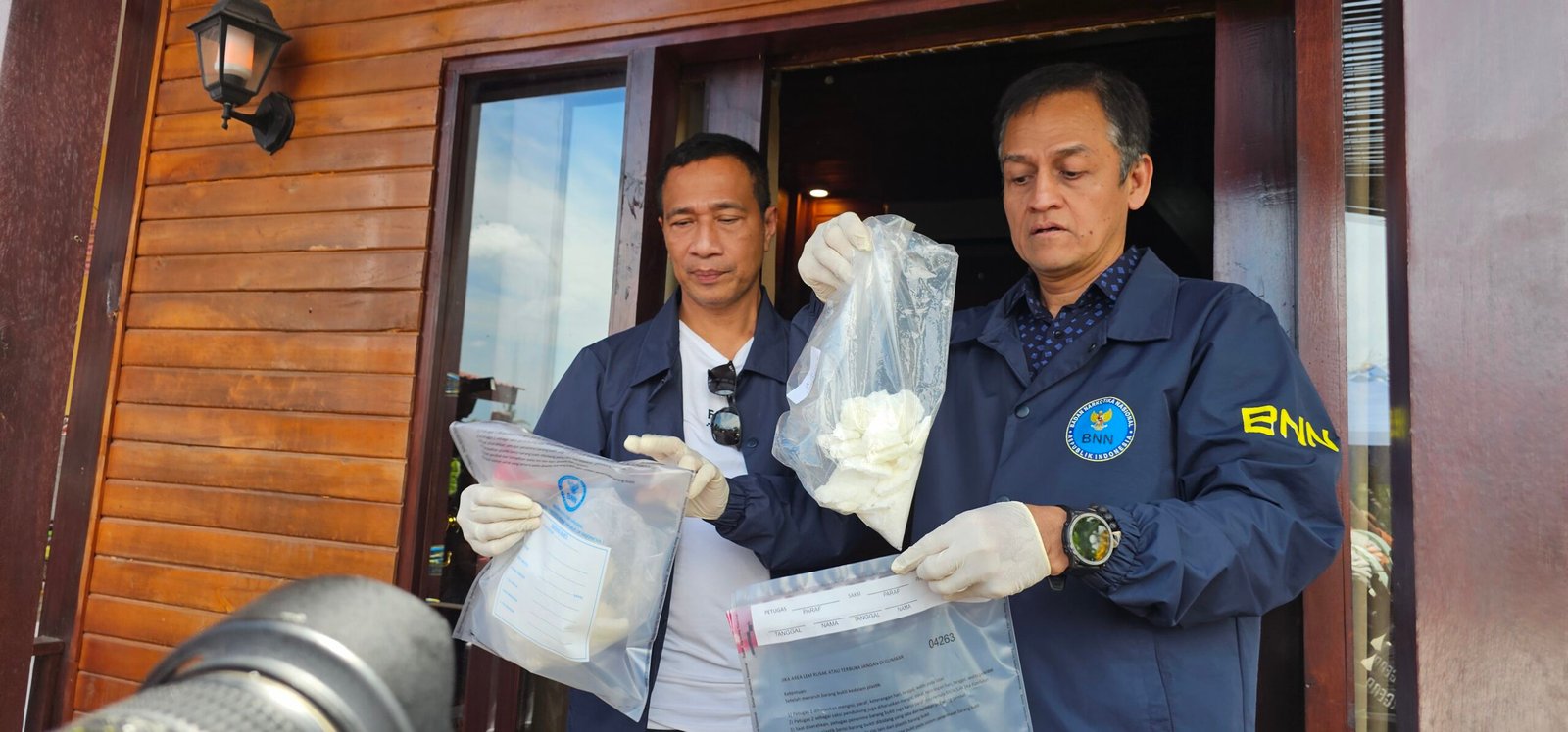 Deputy Narcotics showing drugs sample Mephedrone from villa