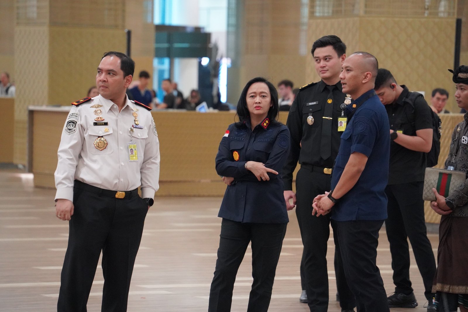 Head officer Immigration and Bali head regional officer securing Immigration line at the airport